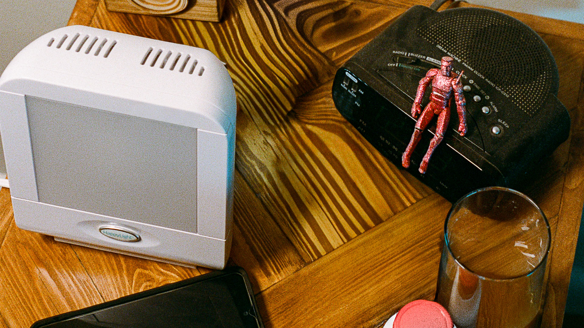 Action hero on bedside table.